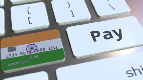 Bankkaart met vlag van India als een toets op het computertoetsenbord van een. Indiase online betaling conceptuele animatie — Stockvideo