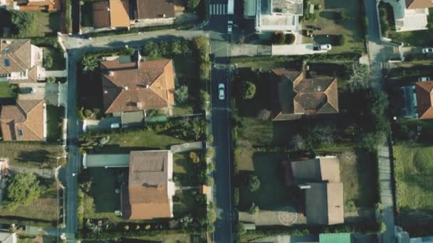 Aerial top down view of mediterranean villas with tiled sloped roofs — Stock Video