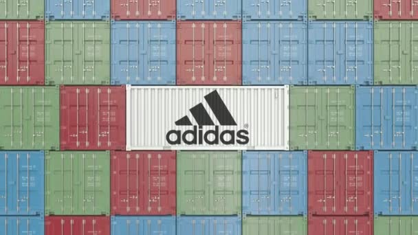 Контейнер с корпоративным логотипом Adidas. Редакционная 3D анимация — стоковое видео