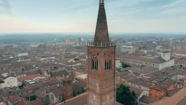 Aerial shot of the bell tower of Santa Maria del Carmine church in Pavia, Italy — Stock Video