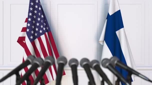 Flags of the United States and Finland at international meeting or negotiations press conference. 3D animation — Stock Video