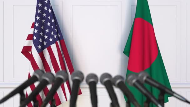 Drapeaux des États-Unis et du Bangladesh lors d'une réunion internationale ou d'une conférence de presse sur les négociations. Animation 3D — Video