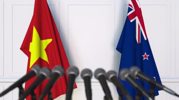 Σημαίες του Βιετνάμ και της Νέας Ζηλανδίας σε διεθνή διάσκεψη τύπου συνάντησης ή διαπραγματεύσεις. 3D animation — Αρχείο Βίντεο