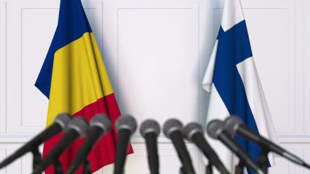 Flaggor i Rumänien och Finland vid internationella förhandlingar eller möte presskonferens. 3D-animering — Stockvideo