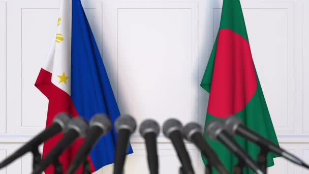 Flags of Philippines and Bangladesh at international meeting or negotiations press conference. 3D animation — Stock Video