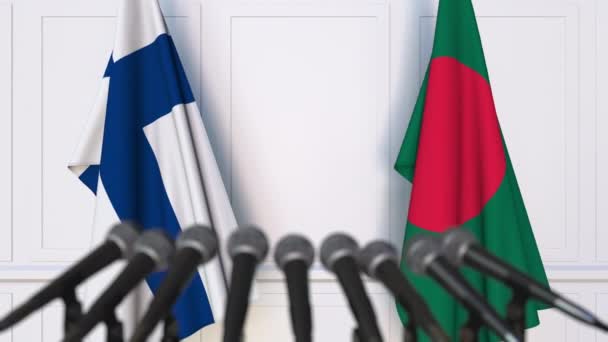 Flags of Finland and Bangladesh at international meeting or negotiations press conference. 3D animation — Stock Video