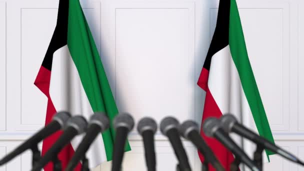 Kuwejcki oficjalnej konferencji prasowej z flagami Kuwejtu. animacja 3D — Wideo stockowe