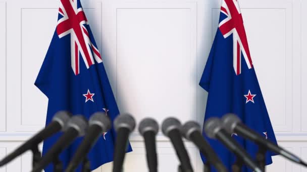 Conferencia de prensa oficial con banderas de Nueva Zelanda. Animación 3D — Vídeos de Stock