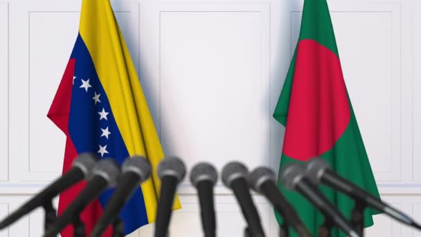 Bandiere del Venezuela e del Bangladesh alla riunione internazionale o alla conferenza stampa dei negoziati. Animazione 3D — Video Stock