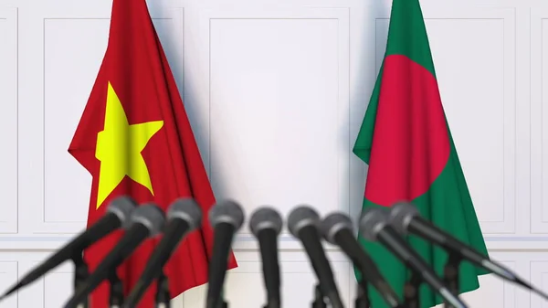 Drapeaux du Vietnam et du Bangladesh lors d'une réunion internationale ou conférence de presse de négociations. rendu 3D — Photo