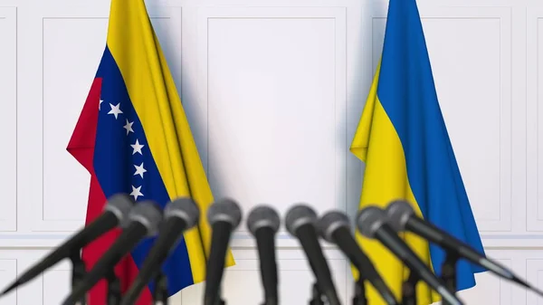 Flags of Venezuela and Ukraine at international meeting or negotiations press conference. 3D rendering — Stock Photo, Image