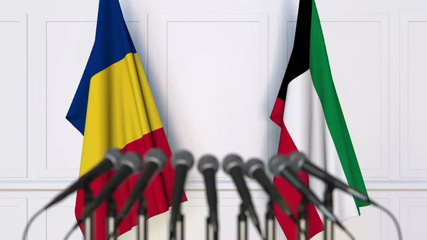 Bandeiras da Roménia e do Kuwait em reunião internacional ou negociações conferência de imprensa. Renderização 3D — Fotografia de Stock