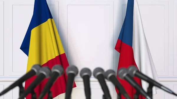 Flaggen Rumäniens und der Tschechischen Republik bei internationalen Treffen oder Verhandlungen Pressekonferenz. 3D-Darstellung — Stockfoto