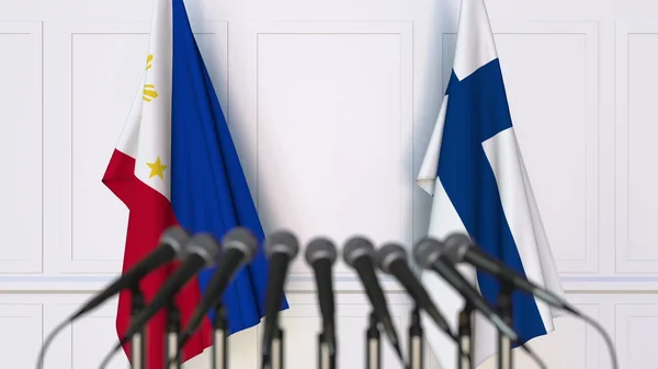 Vlajky z Filipín a Finska na mezinárodní tiskové konferenci zasedání nebo jednání. 3D vykreslování — Stock fotografie