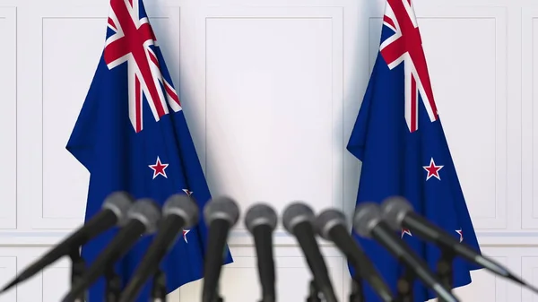 Officiella presskonferens med flaggor i Nya Zeeland. 3D-rendering — Stockfoto