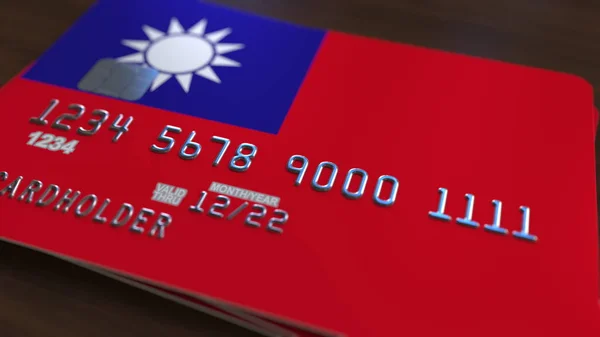 Cartão de crédito com bandeira de Taiwan. Taiwanês sistema bancário conceitual 3D renderização — Fotografia de Stock