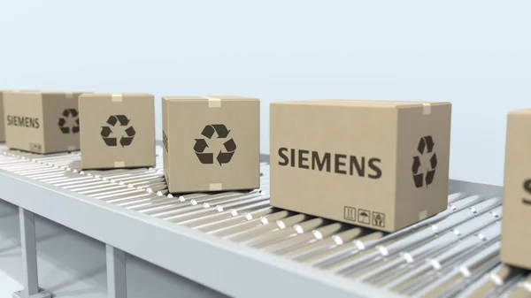 Siemens logosu olan kutular silindir konveyöründe hareket ederler. Editoryal 3D Rendering — Stok fotoğraf