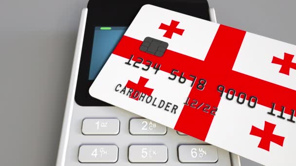 Paying with plastic card with flag of Georgia. Georgian retail sales or banking conceptual 3D animation — Stock Video