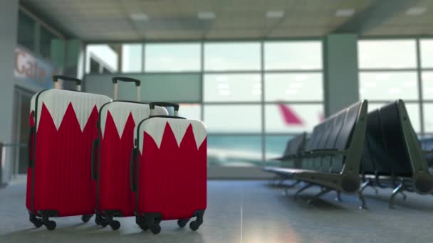 带有巴林国旗的旅行手提箱。巴林旅游概念动画 — 图库视频影像