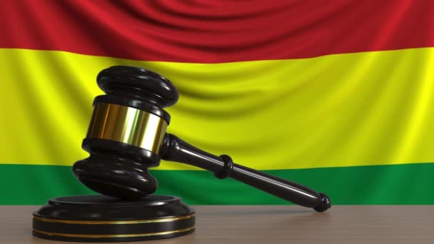 Judges gavel and block against the flag of Bolivia. Bolivian court conceptual animation — Stock Video