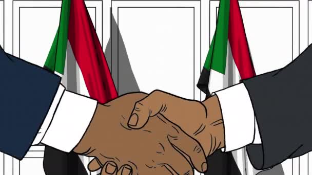 Biznesmeni lub politycy potrząsając ręce przeciwko flagi Sudanu. Animacja z kreskówek na temat spotkań lub współpracy — Wideo stockowe