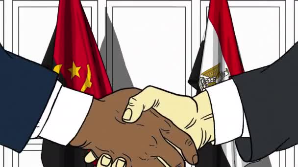 Businessmen or politicians shake hands against flags of Angola and Egypt. Official meeting or cooperation related cartoon animation — Stock Video