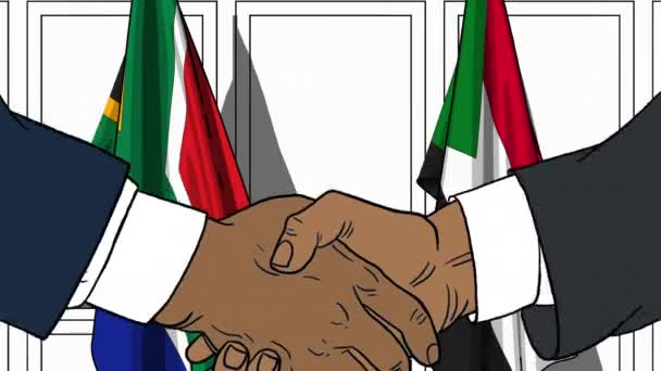 Zakenlieden of politici schudden de handen tegen de vlaggen van Zuid-Afrika en Soedan. Officiële ontmoeting of samenwerking gerelateerde cartoon animatie — Stockvideo