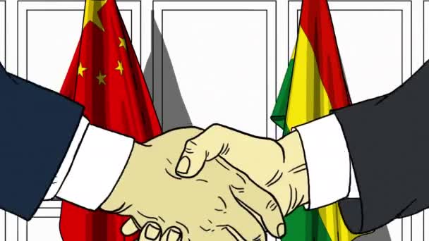 Empresarios o políticos se dan la mano contra banderas de China y Bolivia. Reunión oficial o animación de dibujos animados relacionados con la cooperación — Vídeo de stock