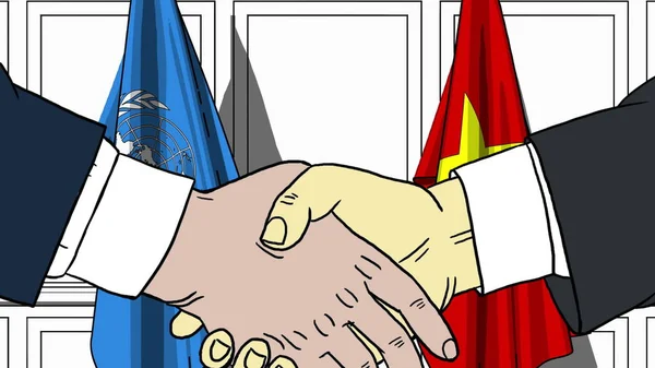 Empresários ou políticos apertam as mãos contra bandeiras das Nações Unidas e do Vietnã. Ilustrações editoriais relacionadas com reuniões oficiais ou cooperação — Fotografia de Stock