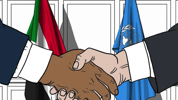 Empresarios o políticos se dan la mano contra las banderas de Sudán y las Naciones Unidas. Reunión oficial o cooperación relacionada con la ilustración editorial — Foto de Stock