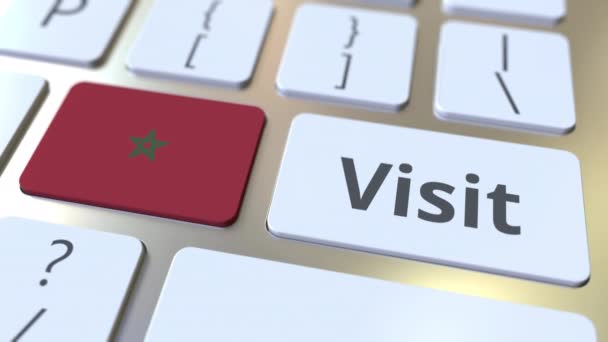 Na tlačítkách na klávesnici počítače navštivte text a vlajku Maroka. Konceptuální 3D animace — Stock video