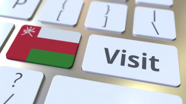 VISIT text and flag of Oman on the buttons on the computer keyboard. Conceptual 3D animation — Stock Video