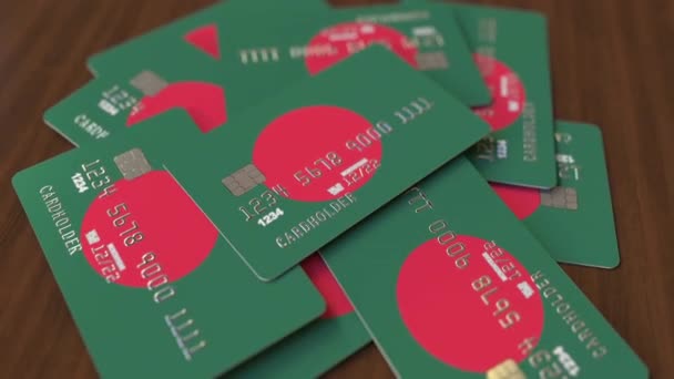 Mucchio di carte di credito con bandiera del Bangladesh. Bangladesh sistema bancario concettuale animazione 3D — Video Stock