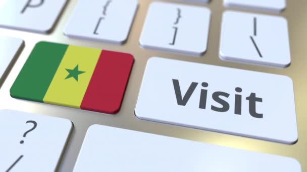 VISIT text and flag of Senegal on the buttons on the computer keyboard. Conceptual 3D animation — Stock Video