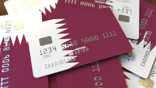Hromada kreditních karet s Katarova vlajkou. Katari bankovní systém konceptuální prostorové vykreslování — Stock fotografie