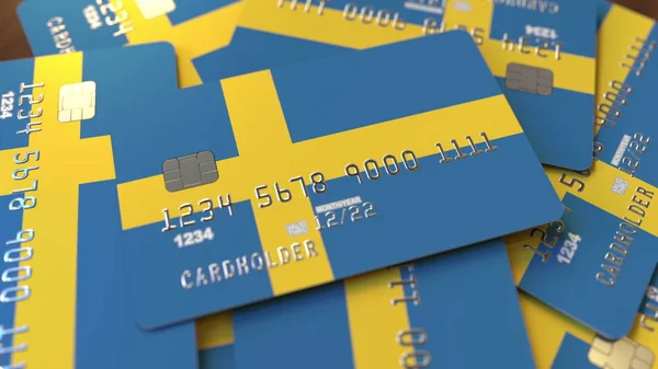 Pile de cartes de crédit avec drapeau de la Suède. Système bancaire suédois rendu 3D conceptuel — Photo