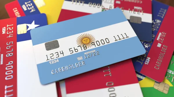 Řada kreditních karet s odlišnými vlajkami, zdůrazňovala bankovní kartu s argentinskou vlajkou. prostorové vykreslování — Stock fotografie