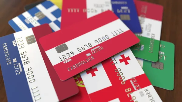 Viele Kreditkarten mit unterschiedlichen Flaggen, hervorgehobene Bankkarte mit Österreich-Flagge. 3D-Darstellung — Stockfoto