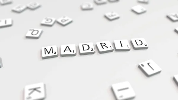 Název města v Madridu se skládal z Scrabble dopisů. Redakční prostorové vykreslování — Stock fotografie