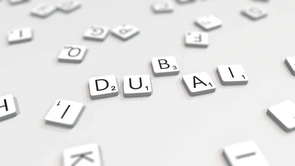 Het maken van Dubai City naam met Scrabble brief tegels. Redactionele 3D-rendering — Stockfoto