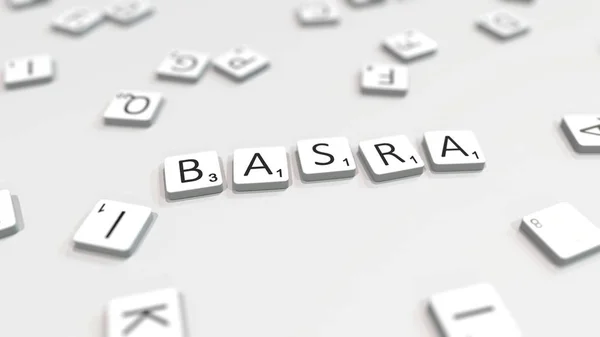 Basra Stadtname, der mit Scrabble-Buchstaben gemacht wird. redaktionelles 3D-Rendering — Stockfoto