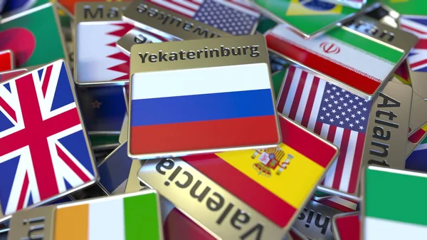 Souvenir magneet of badge met Jekaterinenburg tekst en nationale vlag onder verschillende. Reizen naar Rusland conceptuele 3D-rendering — Stockfoto