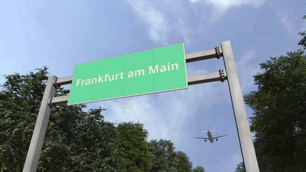 Airplane flies above road sign of Frankfurt am Main, Germany. 3D rendering — Stock Photo, Image