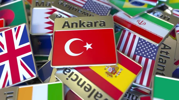 Szuvenír mágnes vagy jelvény Ankara szöveg és nemzeti zászló között a különböző is. Törökországba utazó fogalmi 3D renderelés — Stock Fotó