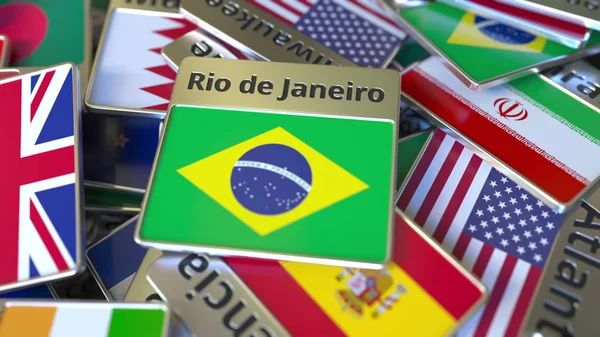 Farklı olanlar arasında Rio de Janeiro metin ve ulusal bayrak ile hediyelik mıknatıs veya rozet. Brezilya'ya seyahat kavramsal 3d render — Stok fotoğraf