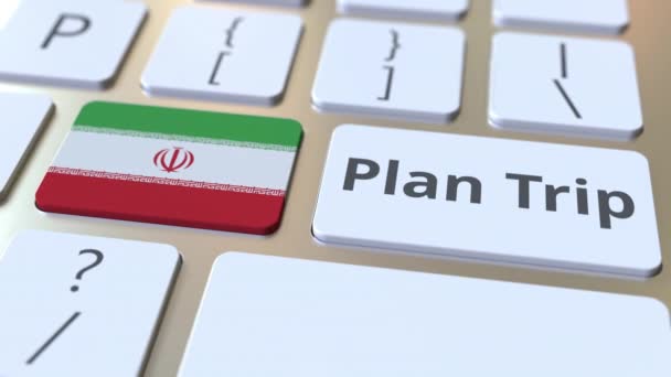 PLAN TRIP text and flag of Iran en el teclado del ordenador, animación 3D relacionada con los viajes — Vídeo de stock