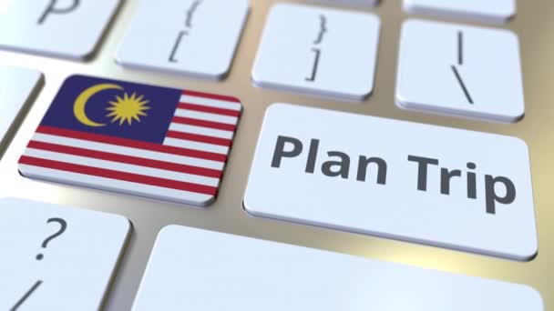 Planera resa text och flagga av Malaysia på det computern klaviatur, resa berättat 3D livligheten — Stockvideo