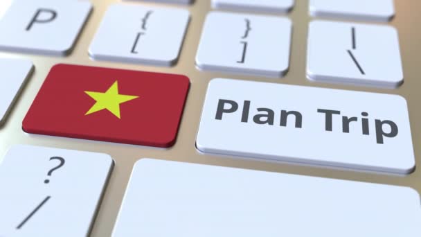 PLAN TRIP text and flag of Vietnam en el teclado del ordenador, animación 3D relacionada con los viajes — Vídeo de stock