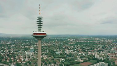 FRANKFURT AM MAIN, GERMANY - APRIL 29, 2019. Top of famous Europaturm, high telecommunications tower, aerial view clipart