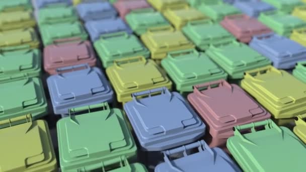 Rows of trash containers for sorting recycled garbage. Loopable motion background — Stock Video